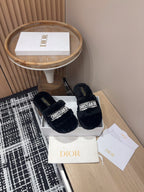 DIOR THICK-SOLE SLIPPERS BLACK SHEARLING WITH EMBROIDERED LOGO