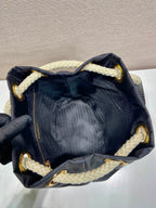 PRADA BUCKET BAG 28 IN BLACK RE-NYLON GOLD LOGO