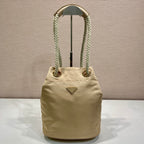 PRADA BUCKET BAG 28 IN BEIGE RE-NYLON GOLD LOGO