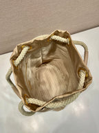 PRADA BUCKET BAG 28 IN BEIGE RE-NYLON GOLD LOGO