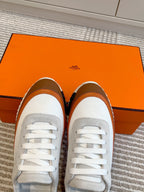 HERMES BOUNCING SNEAKER IN WHITE GRAPHIC MESH AND BRONZE BROWN CALFSKIN