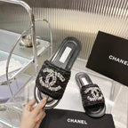 CHANEL Slippers BLACK CALFSKIN LOGO