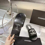 CHANEL Slippers BLACK CALFSKIN LOGO