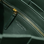BOTTEGA VENETA CASSETTE 23 IN DARK GREEN CALFSKIN