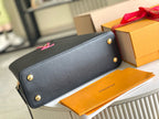 LOUIS VUITTON CAPUCINES MM 31 BLACK GOLD HARDWARE