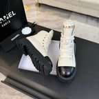 CHANEL ANKLE BOOTS IN WHITE MIX BLACK CALFSKIN 936574