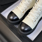 CHANEL ANKLE BOOTS IN WHITE MIX BLACK CALFSKIN 936574