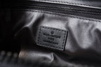 LOUIS VUITTON DOPP KIT TOILETRY BAG 28 CM IN BLACK TAURILLON MONOGRAM LEATHER