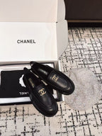 CHANEL SLINGBACK LOAFER IN BLACK CALFSKIN AND SHEARLING