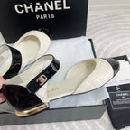 CHANEL CLASSIC MARY JANE FLATS IN WHITE AND BLACK QUILTED CALFSKIN