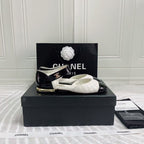 CHANEL CLASSIC MARY JANE FLATS IN WHITE AND BLACK QUILTED CALFSKIN
