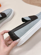 HERMES 25S SLIP-ON IN BLUE DENIM AND BLACK LAMBSKIN