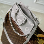 LOUIS VUITTON ONTHEGO EAST WEST BAG 25 IN BICOLOR MONOGRAM EMPREINTE LEATHER