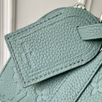 LOUIS VUITTON KEEPALL BANDOULIÈRE 25 BAG IN MISTY LAKE GREEN MONOGRAM TAURILLON CALFSKIN