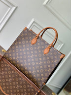 LOUIS VUITTON ONTHEGO ORGANIZER 37 IN BROWN COATED CANVAS AND CALFSKIN