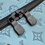 LOUIS VUITTON KEEPALL BANDOULIÈRE 50 IN SKY BLUE MONOGRAM SHADOW EMBOSSED CALFSKIN