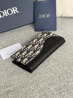 DIOR VERTICAL BIFOLD WALLET 19 IN BLACK GRAINED CALFSKIN MIX BLUE MONOGRAM OBLIQUE JACQUARD