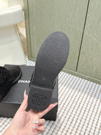 CHANEL 25S SHORT BOOTS IN BLACK CALFSKIN WITH SHEEPSKIN LINING