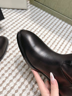 CHANEL 25S MID-CALF BOOTS IN BLACK CALFSKIN