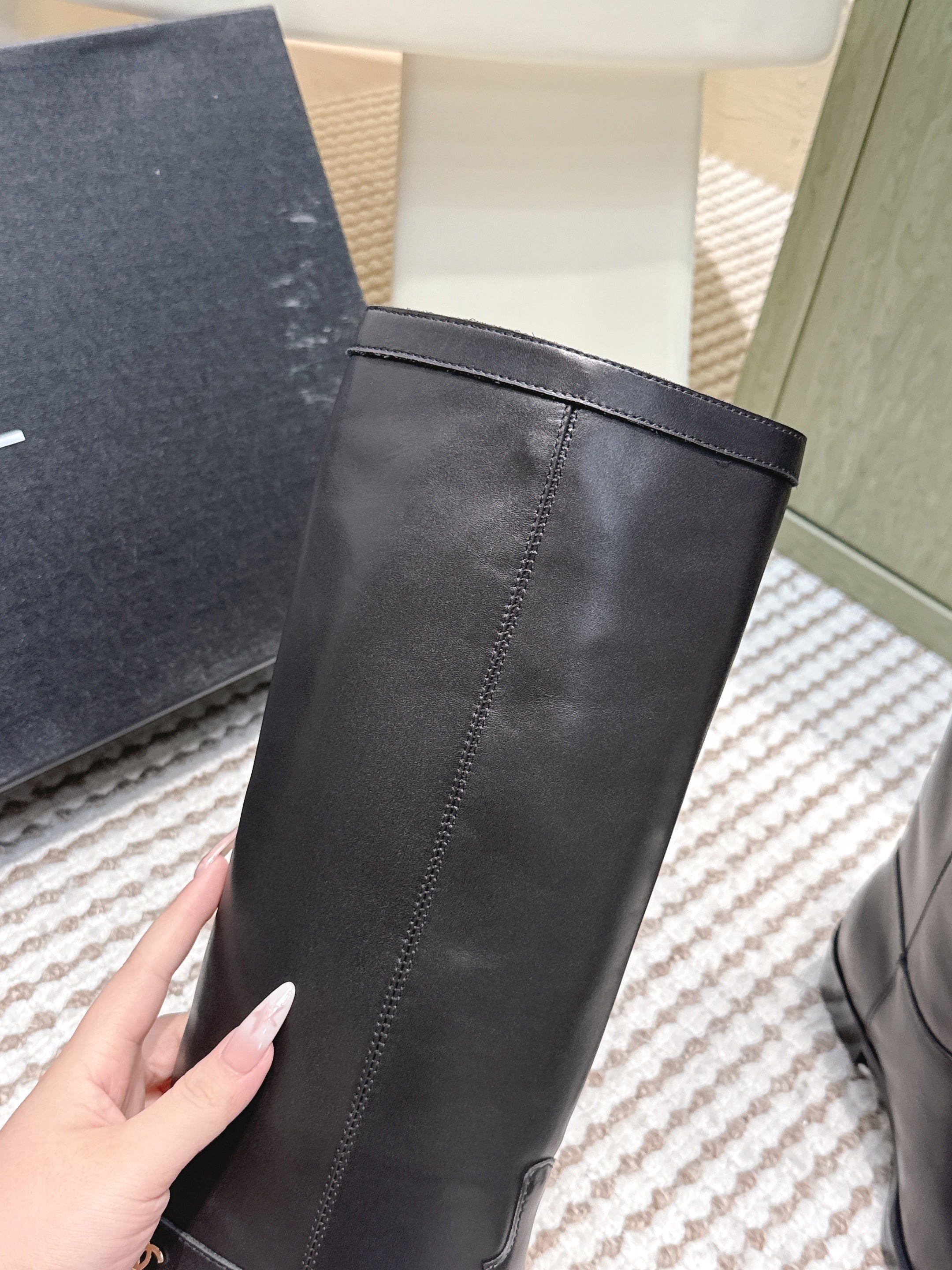 CHANEL 25S KNEE-HIGH BOOTS IN BLACK CALFSKIN