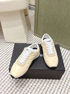 CHANEL 25S SNEAKERS IN LIGHT YELLOW CALFSKIN AND SUEDE