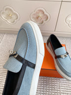 HERMES 25S SLIP-ON IN SKY BLUE CANVAS AND BLACK LAMBSKIN WITH SILVER HARDWARE
