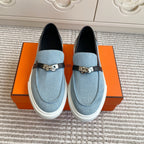 HERMES 25S SLIP-ON IN SKY BLUE CANVAS AND BLACK LAMBSKIN WITH SILVER HARDWARE