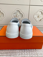 HERMES 25S SLIP-ON IN SKY BLUE CANVAS WITH SILVER HARDWARE