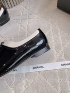 CHANEL 25S TWO TONE LACE UP IN BLACK AND WHITE SHINY CALFSKIN