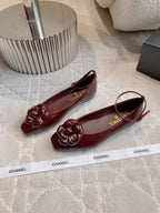 CHANEL 25S CAMELLIA SQUARE TOE FLATS IN ROSSO ANCORA CALFSKIN GOLD HARDWARE
