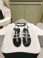 CHANEL SANDALS PEARL ROMAN IN BLACK LAMBSKIN