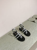CHANEL SANDALS PEARL ROMAN IN BLACK LAMBSKIN