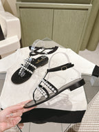 CHANEL SANDALS PEARL ROMAN IN BLACK LAMBSKIN