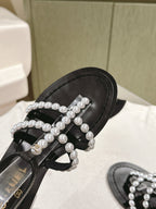 CHANEL SANDALS PEARL ROMAN IN BLACK LAMBSKIN