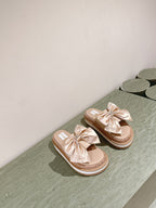 CHANEL SLIPPERS WITH SILK BOW IN BEIGE ALMOND COWHIDE