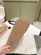 CHANEL SLIPPERS WITH SILK BOW IN BEIGE ALMOND COWHIDE