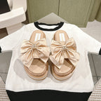 CHANEL SLIPPERS WITH SILK BOW IN BEIGE ALMOND COWHIDE