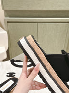 CHANEL SLIPPERS WITH SILK BOW IN BLACK COWHIDE