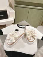 CHANEL SLIPPERS WITH SILK BOW IN WHITE COWHIDE