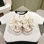 CHANEL SLIPPERS WITH SILK BOW IN WHITE COWHIDE
