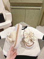 CHANEL SLIPPERS WITH SILK BOW IN WHITE COWHIDE
