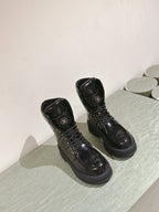 CHANEL MARTIN BOOTS IN BLACK EMBROIDERED CALFSKIN
