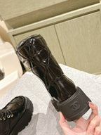 CHANEL MARTIN BOOTS IN BLACK EMBROIDERED CALFSKIN