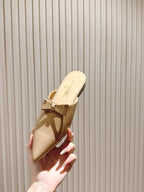 CHANEL FLAT MULES 25S IN BEIGE PATENT LEATHER