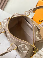 LOUIS VUITTON SPEEDY BANDOULIÈRE 20 IN TAUPE BROWN AND WHITE MONOGRAM EMPREINTE LEATHER