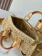 LOUIS VUITTON KEEPALL BANDOULIÈRE 25 IN BEIGE CROCHETED RAFFIA AND CALFSKIN TRIM