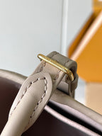 LOUIS VUITTON BABYLONE TOTE 31 IN TOURTERELLE MONOGRAM EMPREINTE LEATHER