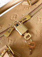 LOUIS VUITTON SPEEDY SOFT 30 IN PALE ORANGE EMBOSSED CALFSKIN