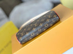 LOUIS VUITTON LV 25S POCHETTE TIRETTE 22 IN DARK BROWN MONOGRAM CANVAS GOLD HARDWARE