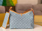 LOUIS VUITTON LV 25S CARRYALL 29 IN LIGHT BLUE DENIM MONOGRAM LEATHER TRIM